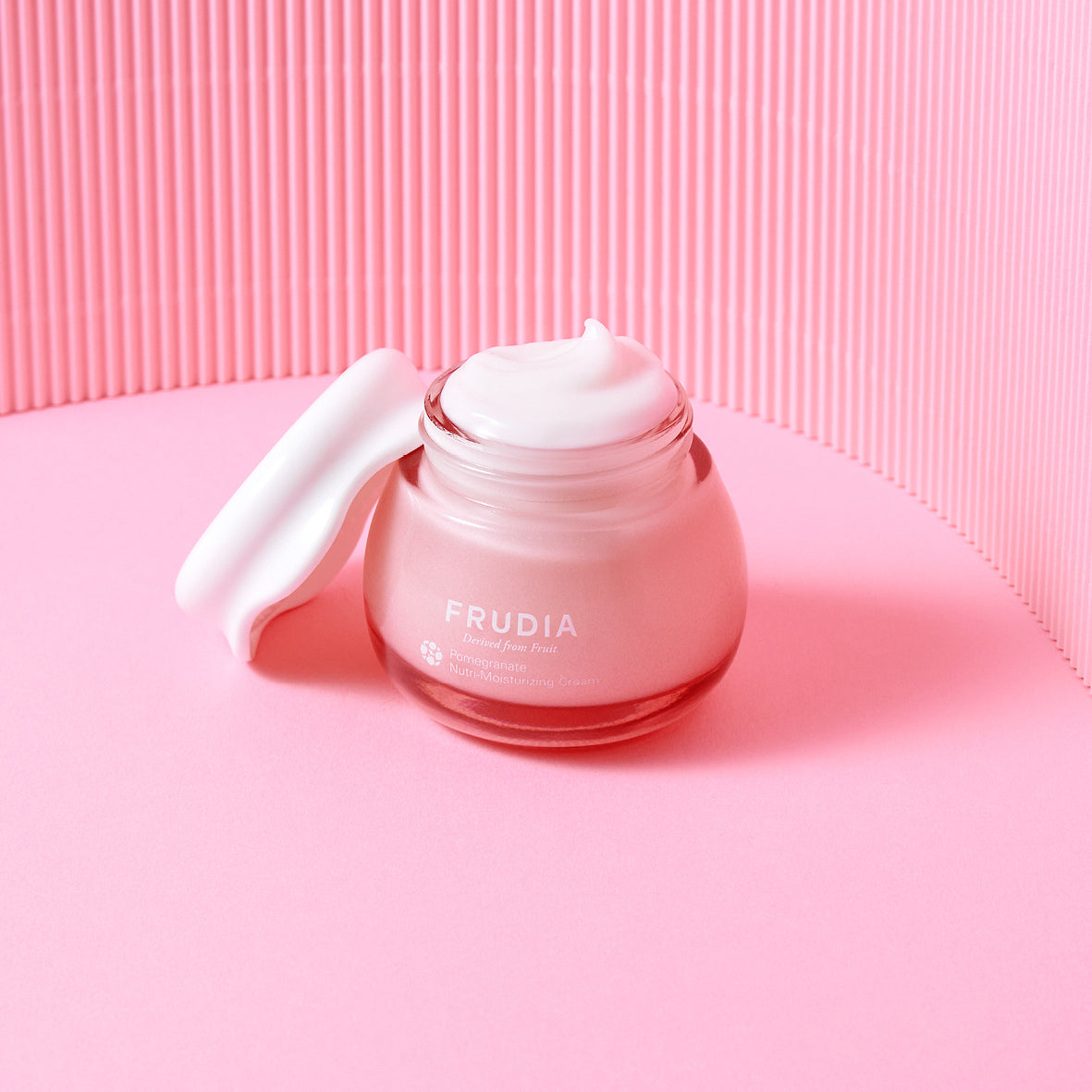 FRUDIA Pomegranate Nutri-Moisturizing Cream 55g Available on Seoulbazaar, your online store for trendy korean products.